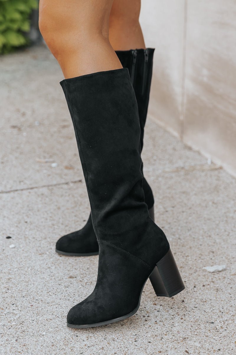 Black heeled knee length boots online