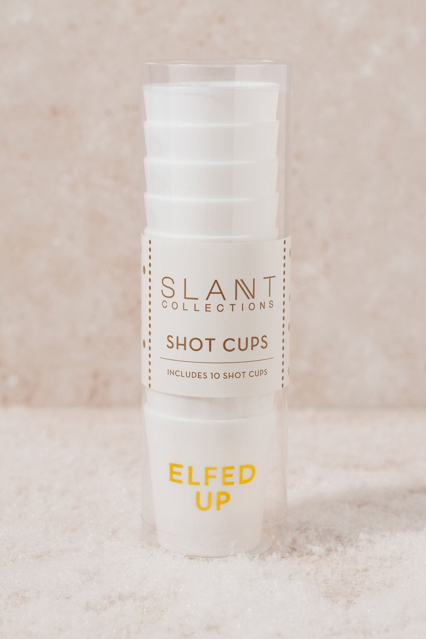 White Elfed Up Shot Cups come in clear packaging—festive party cups perfect for your next holiday gathering.