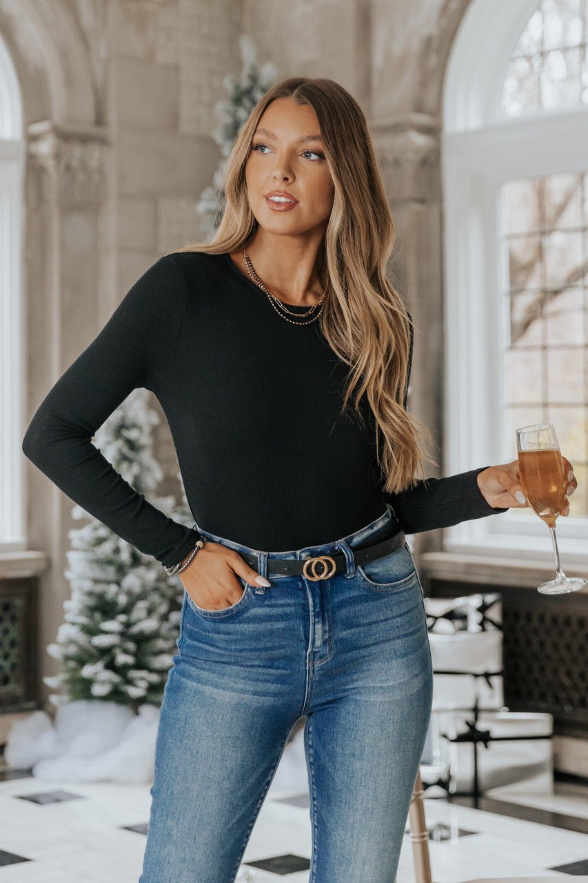 http://magnoliaboutique.com/cdn/shop/products/drop-the-ball-ribbed-long-sleeve-bodysuit-final-sale-500354.jpg?v=1692402264