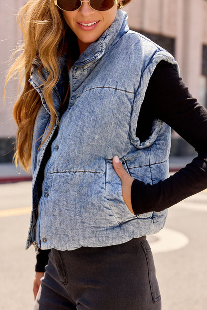 Smiling outdoors in the Vintage Havana Puffer Vest - Denim | Pre Order—ideal women’s fall outerwear for easy, stylish layering.