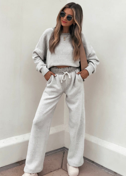 Jill is standing outdoors wearing our Grey Brushed Lounge Sweatshirt & our Grey Brushed Lounge Sweatpants