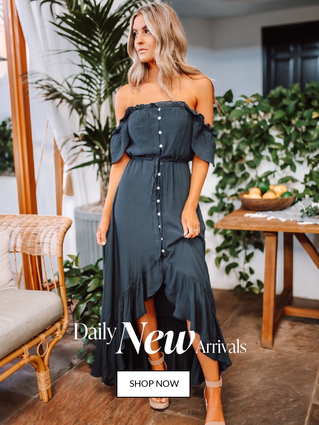 Daily New Arrivals Home Page image. Mykal is wearing out bestselling Off The Shoulder Maxi in Navy.