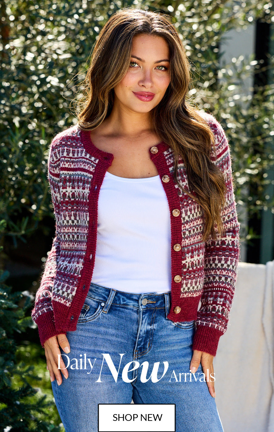Daily New Arrivals home page banner. Britt is wearing our Wine Fair Isle Button Down Cardigan.