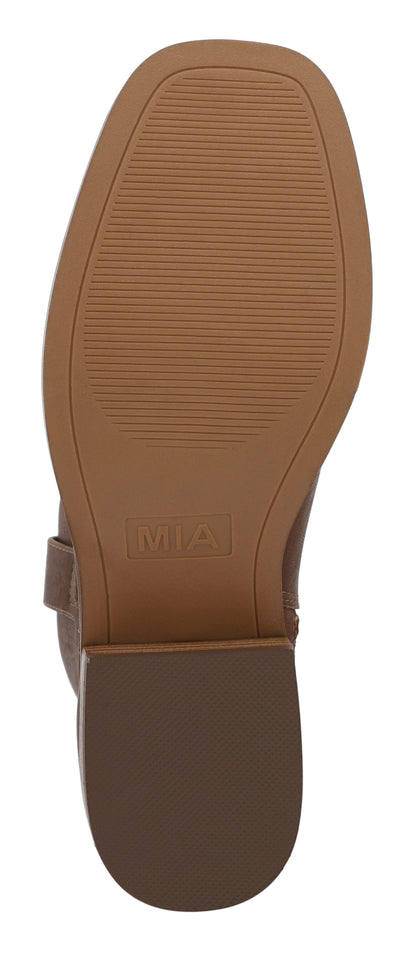 The image shows the brown sole of MIA Miley Mid Calf Boots in tan with a low heel and "MIA" embossed on the bottom.