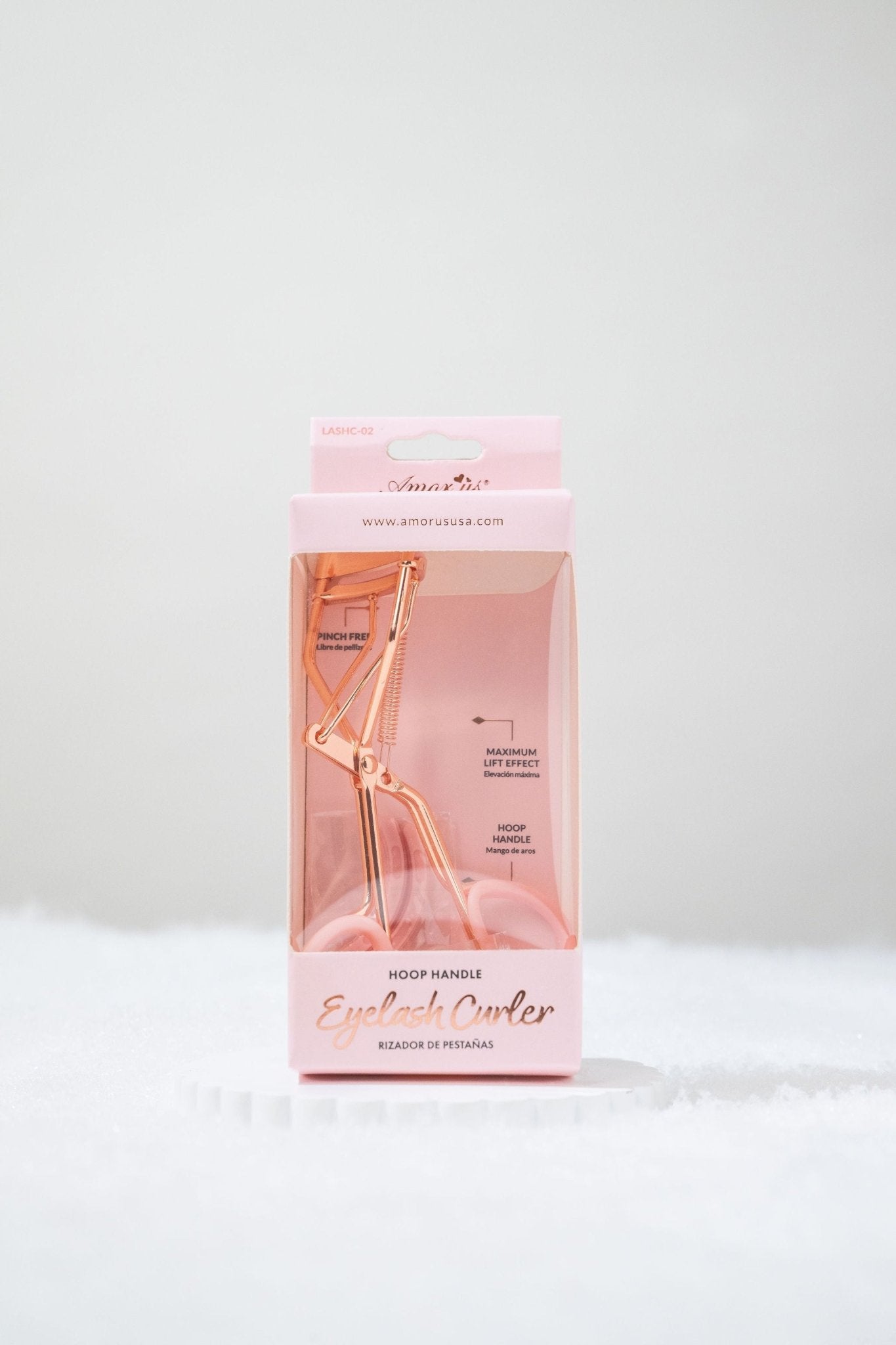 Beauty Creations Pink Eyelash Curler comes in a pink box with a clear front—perfect for upgrading your beauty routine.