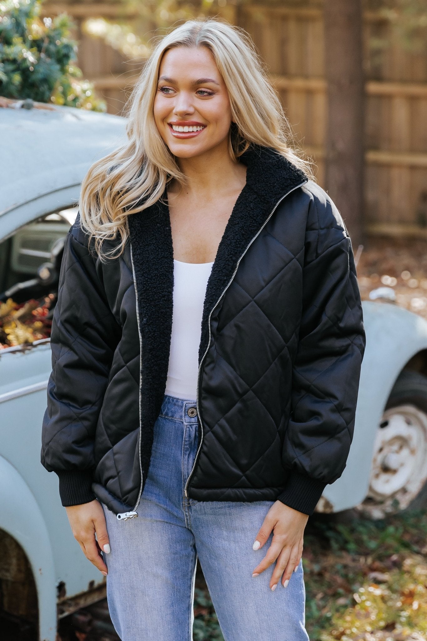 Black faux fur reversible puffer jacket on sale