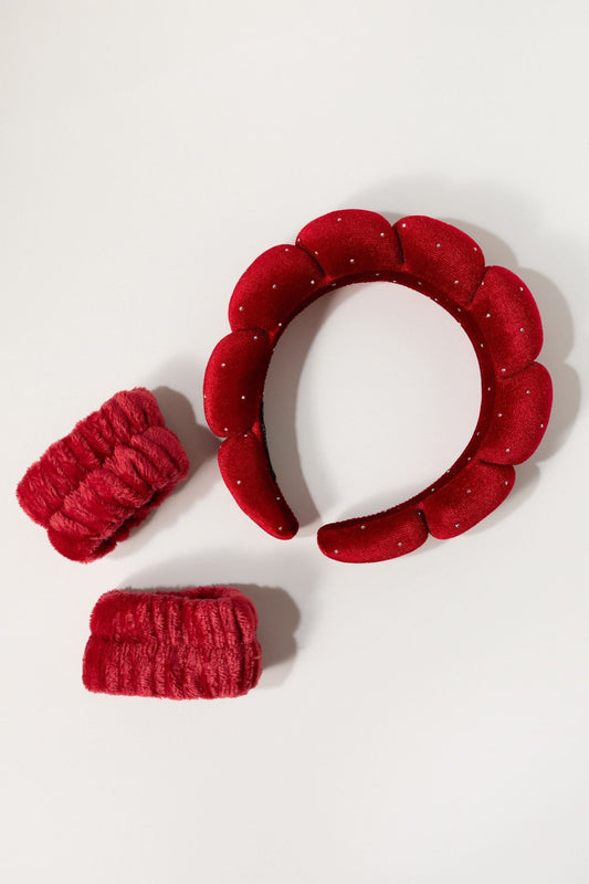 Cala Spa Headband & Wristband Set in red with rhinestones and two scrunchies—an elegant self-care gift on a white background.