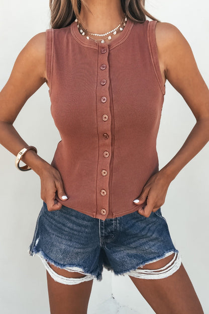 Woman wears the Easy Days Button Front Tank Top in terracotta with distressed denim shorts, styled with necklaces and a bracelet.
