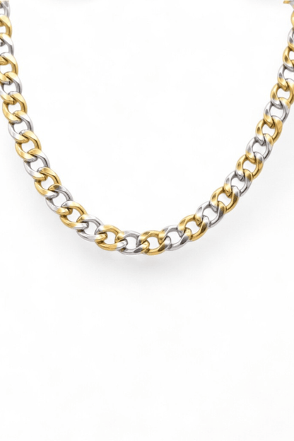Close-up of the Farrah B Gold Plated Mixed Metal Chain Necklace, featuring alternating gold and silver links on white.