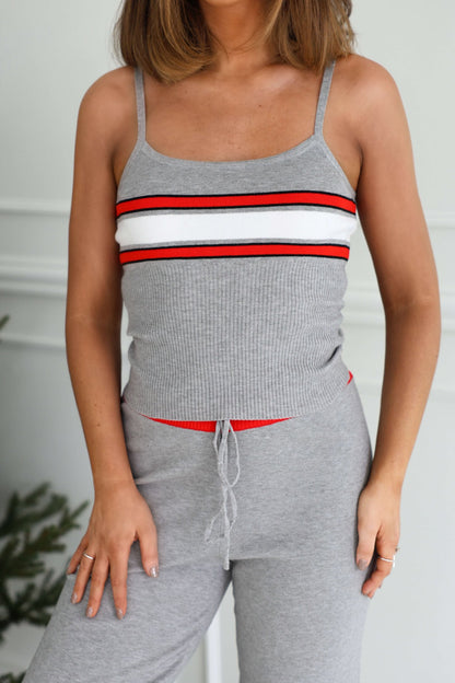 Woman wears the Grey Striped Rib Knit Tank Top - FINAL SALE, a Magnolia exclusive, indoors.