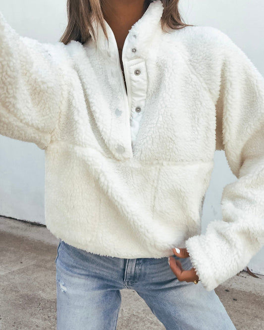 Half ZIP Sherpa Jacket - White worn with blue jeans.