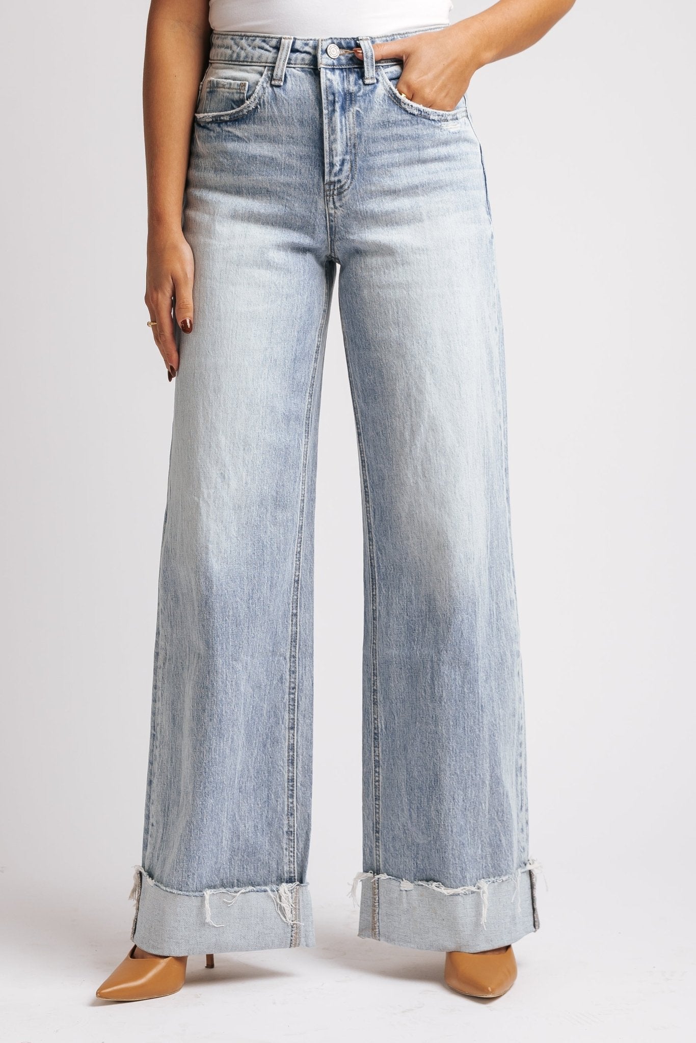 Someone wears Light Wash Baggy Cuffed Wide Leg Jeans - FINAL SALE with tan pointed-toe heels.