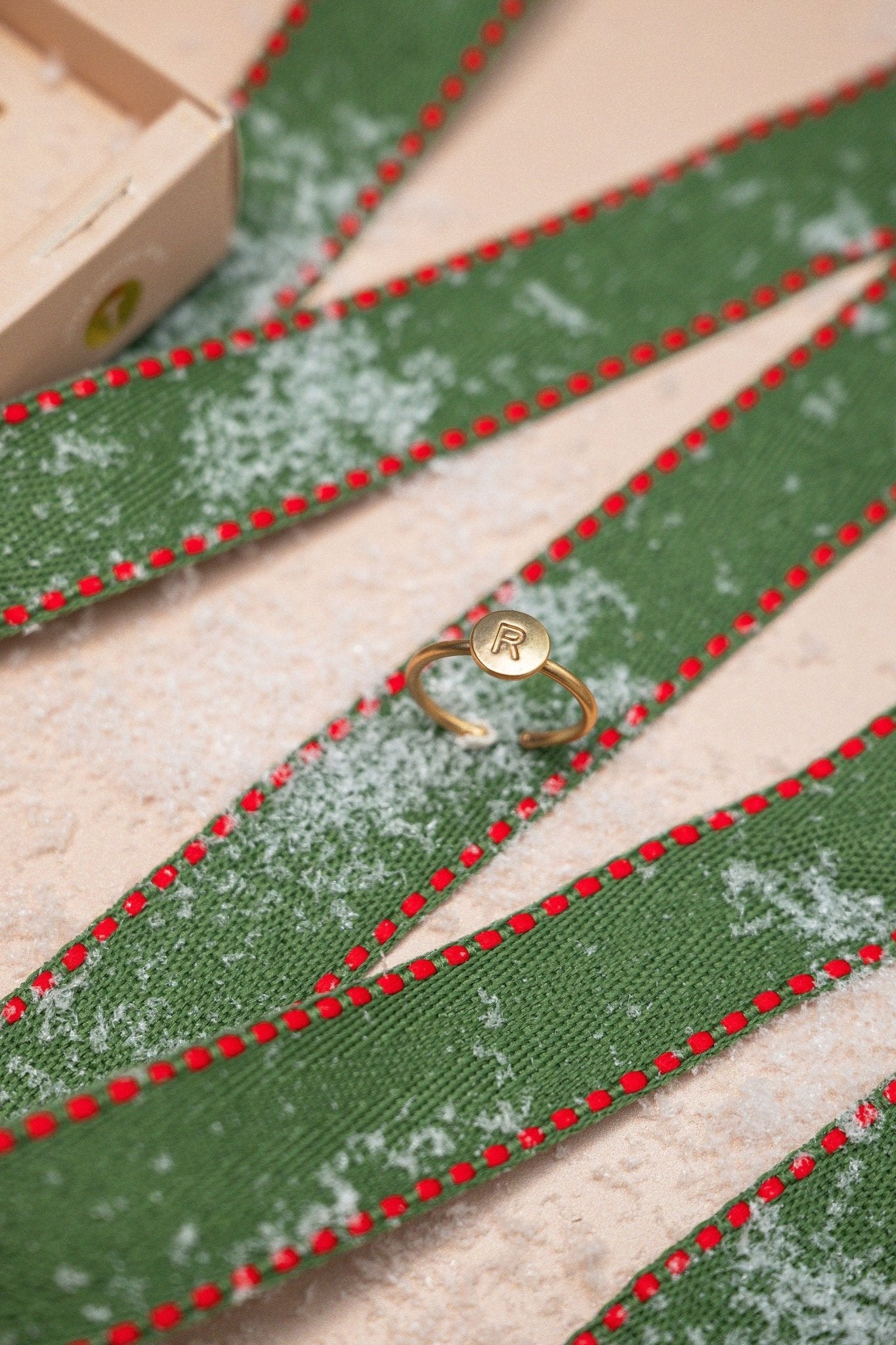 The Lucky Feather Gold Initial Pendant Ring - FINAL SALE adds a personalized touch to your jewelry collection.