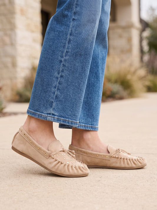 Matisse Sebastian Slip On Moccasins - Natural in beige suede with decorative stitching and gold studs, worn with blue jeans.