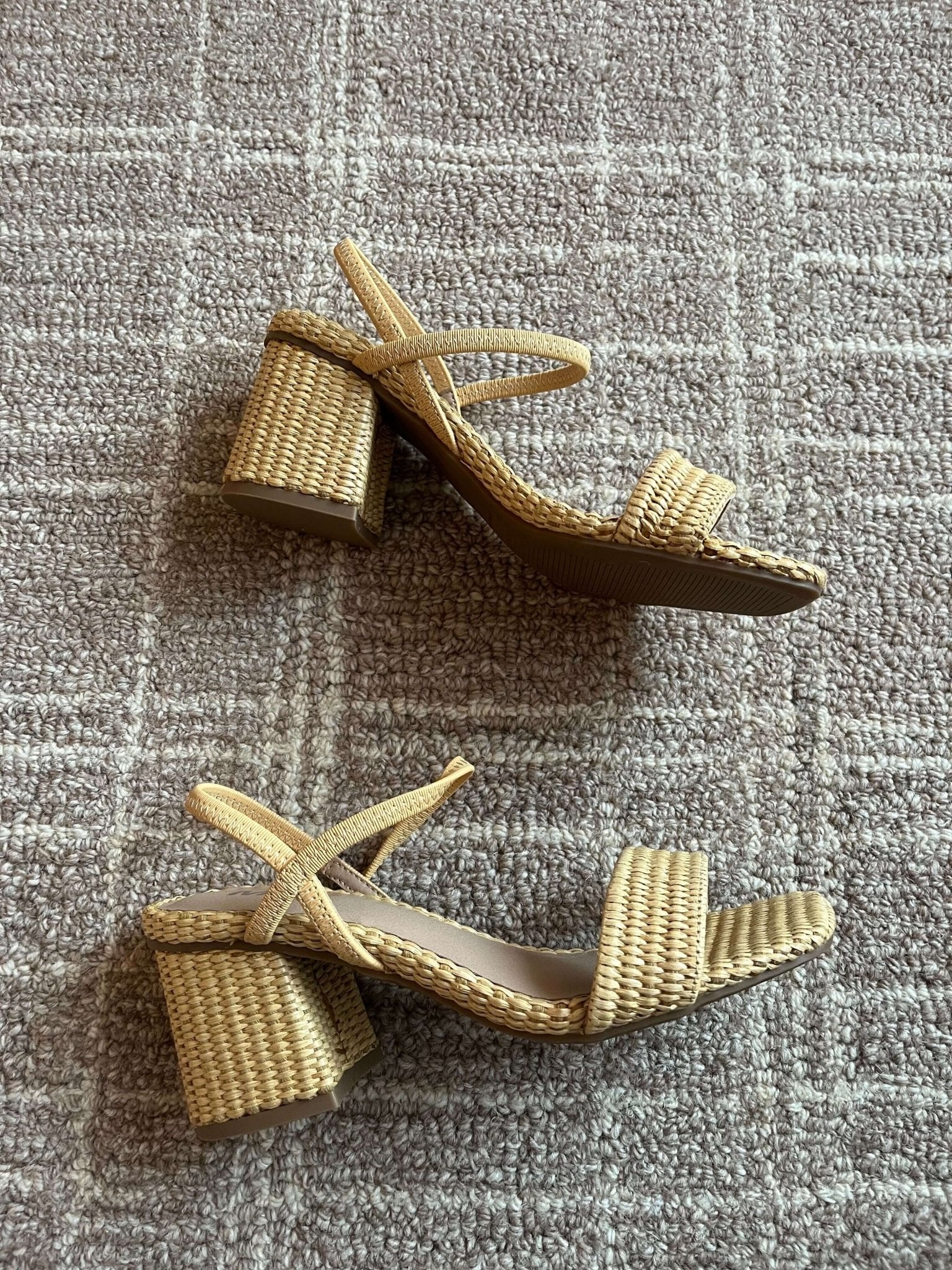 Two tan MIA Zissy Natural Strappy Heels with crisscross ankle straps are placed on a textured beige carpet.