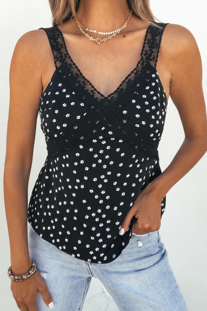 Woman wearing the Midnight Lace Print Tank Top - Black, styled with layered necklaces and light blue jeans.