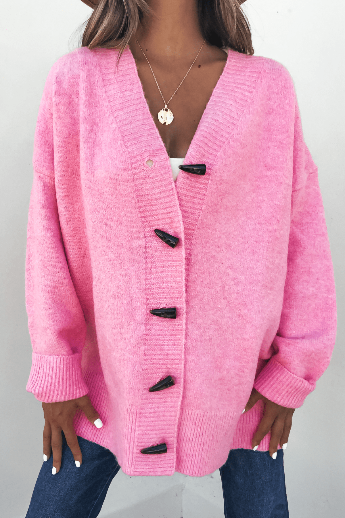 Woman in the Pink Brushed Button Down Sweater Cardigan—stylish, bump-friendly, and perfect for fall.