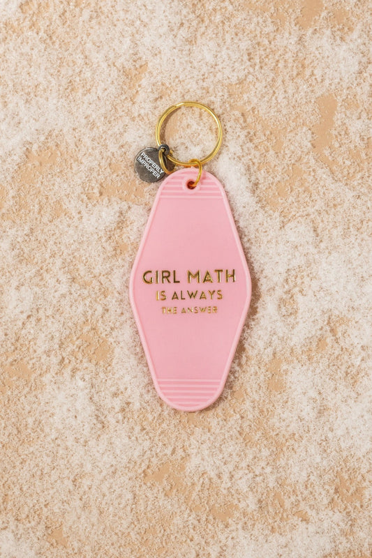 The Pink Girl Math Motel Keychain is a perfect math gift with gold text and retro style on a beige textured surface.