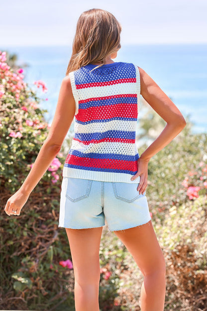Woman outdoors facing away, wearing the Stars & Stripes Tie Front Sweater Vest with light denim shorts.