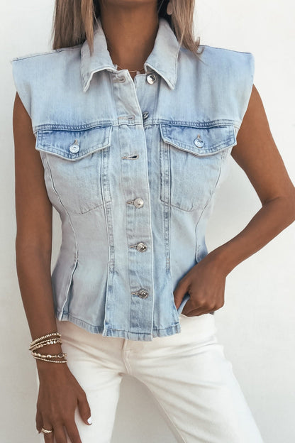 Woman in a Steve Madden Cassady Denim Top and white pants against a plain background.