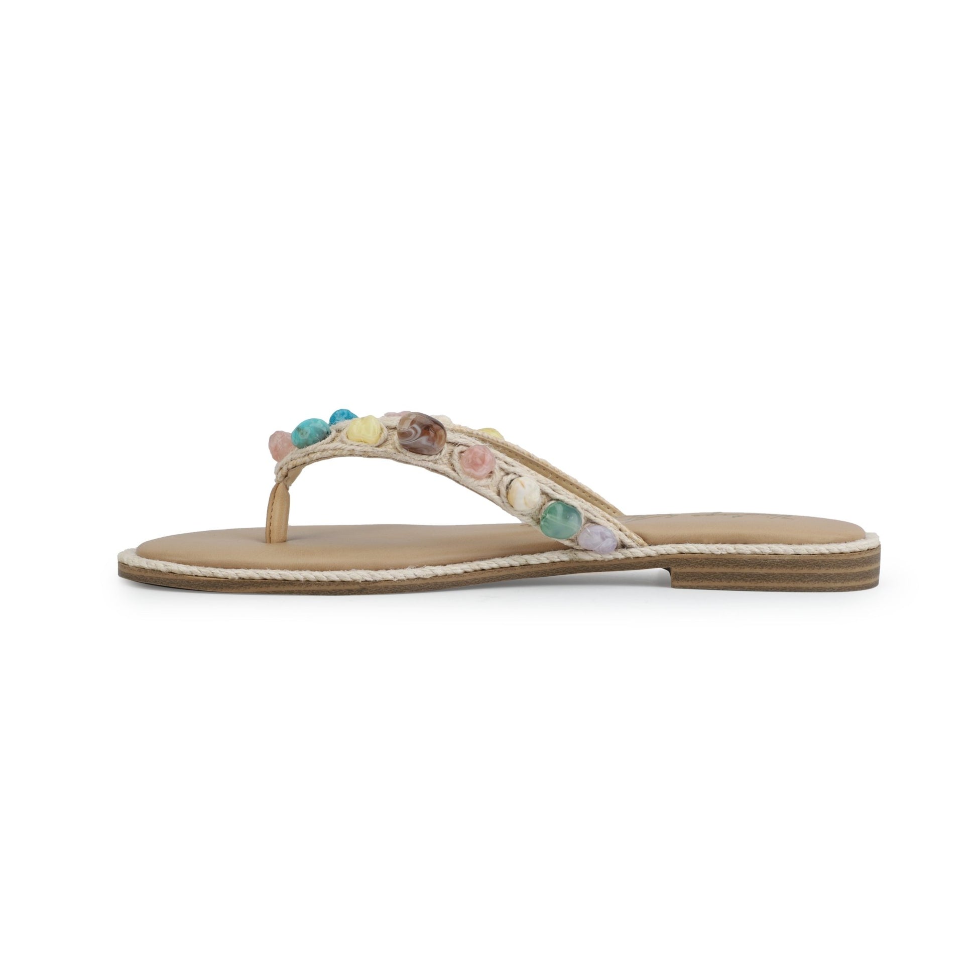Vintage Havana Sandy Beige Gemstone Flip Flops feature a tan sole, thong strap, and pastel stones and flowers for a retro vibe.