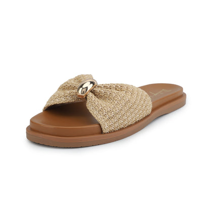 The Vintage Havana Yvette Beige Slide Sandals feature beige woven straps, a brown sole, and a chic gold accent.