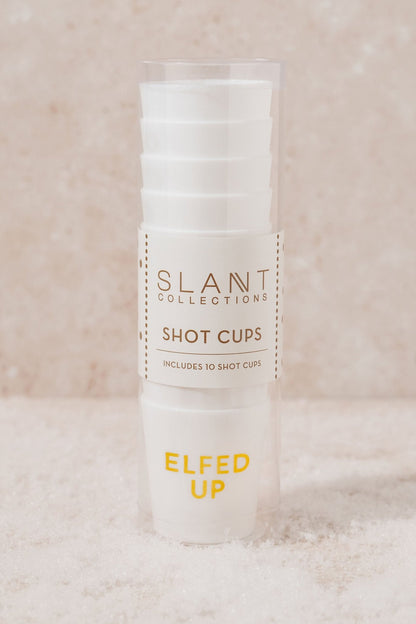 White Elfed Up Shot Cups come in clear packaging—festive party cups perfect for your next holiday gathering.