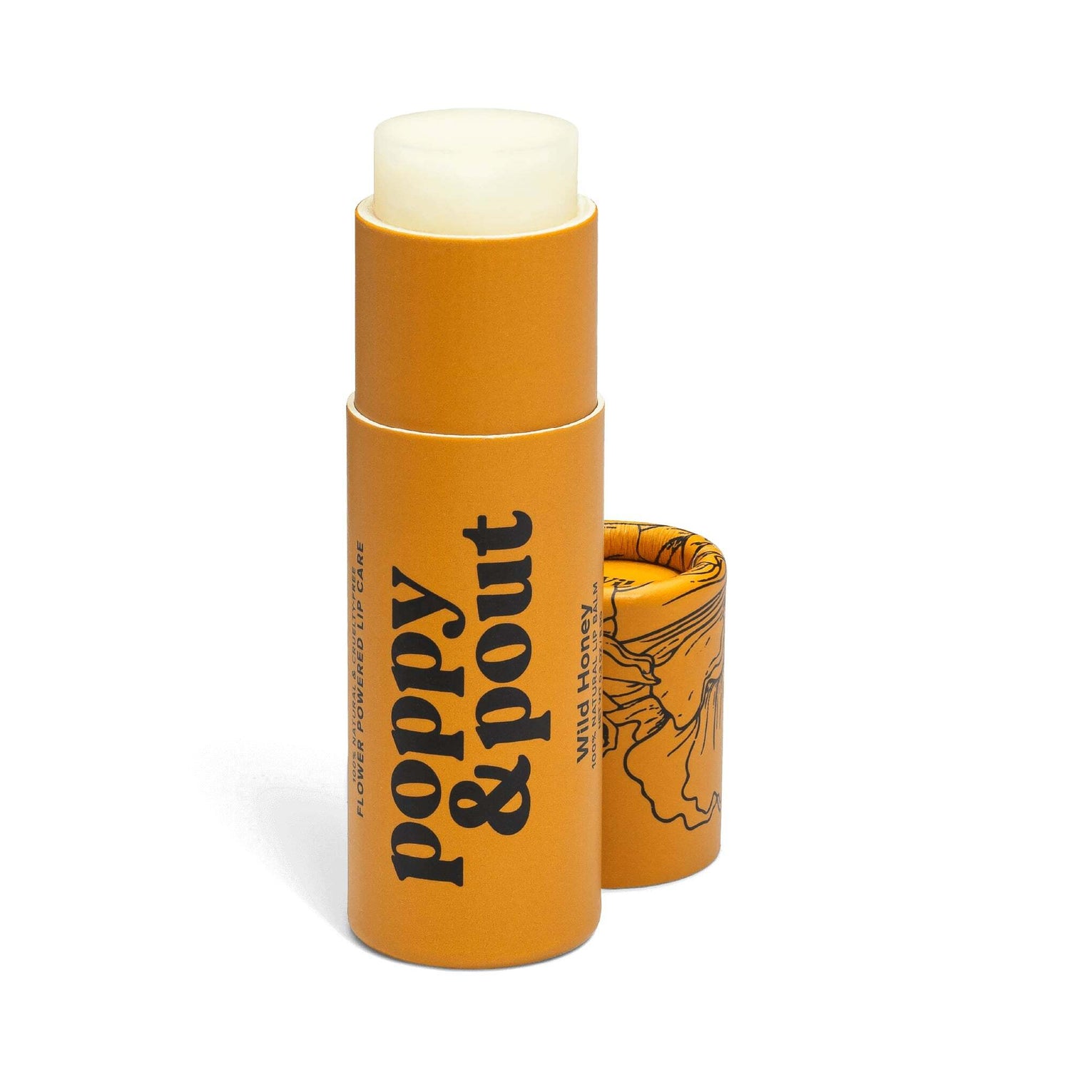 An orange tube of Wild Honey Lip Balm - FINAL SALE stands upright with its illustrated cap beside it.